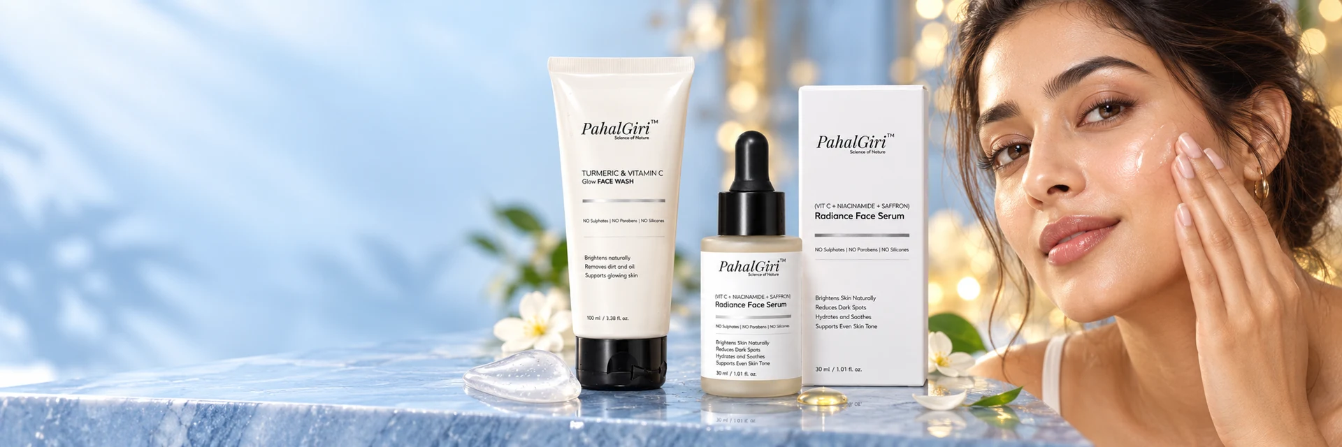 Illustrative model patting serum onto her cheek beside one face wash, one serum and its carton